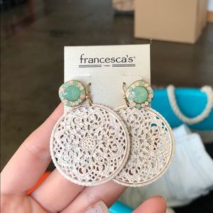 Two separate earrings